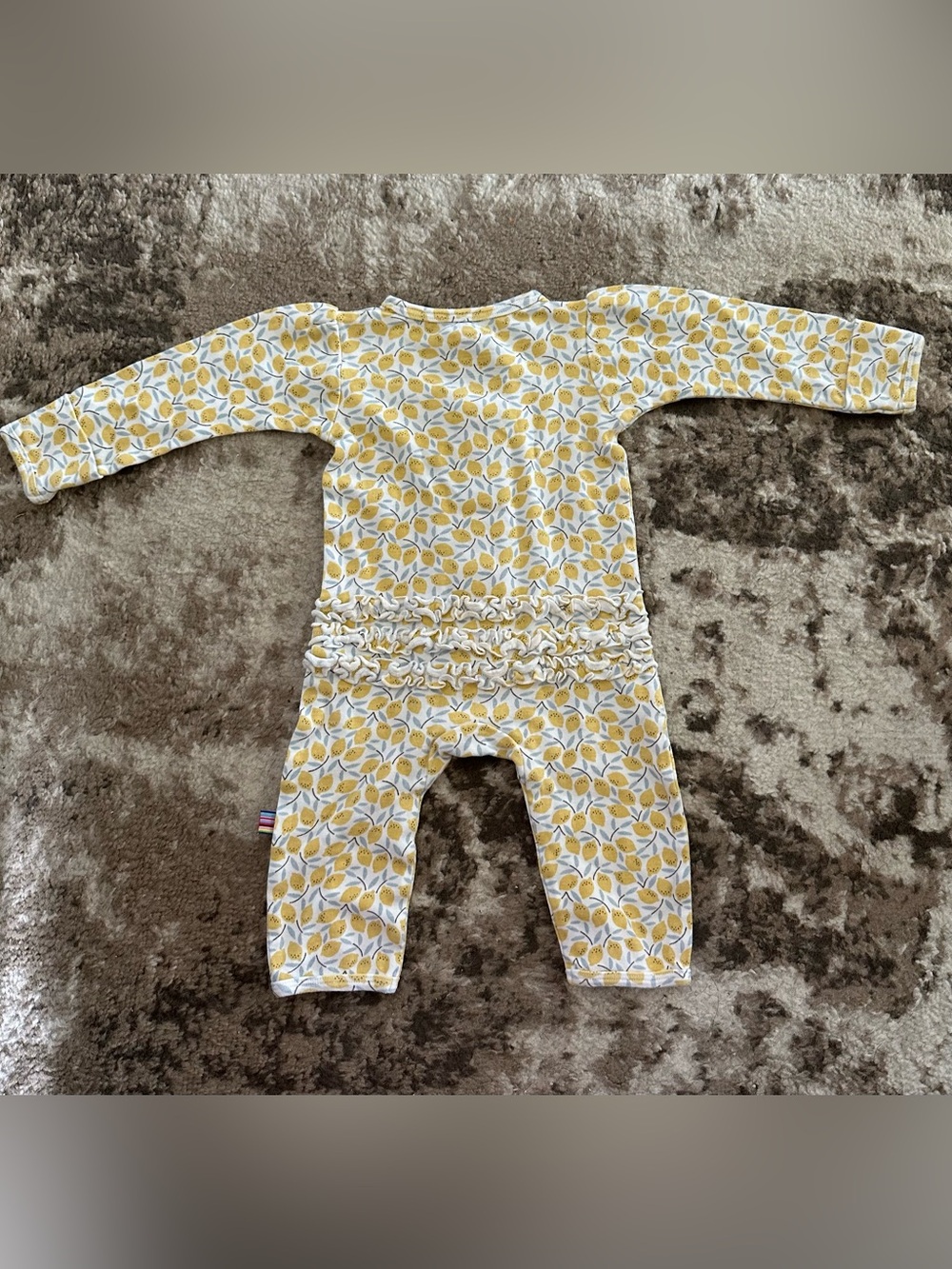 Magnetic Me Yellow Leaf-Print Footed One-Piece with Ruffle Back